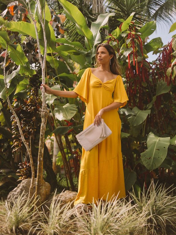 photo-of-woman-wearing-yellow-long-dress-3645369
